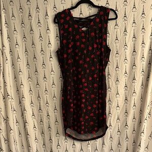 Black Sleeveless Dress with Red Floral Pattern